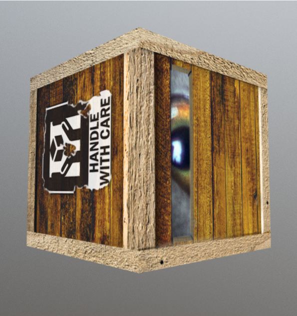 handle with care crate containing giant cat's eye